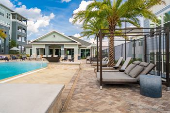 Luxurious Pool & Sundeck with Lounge Chairs